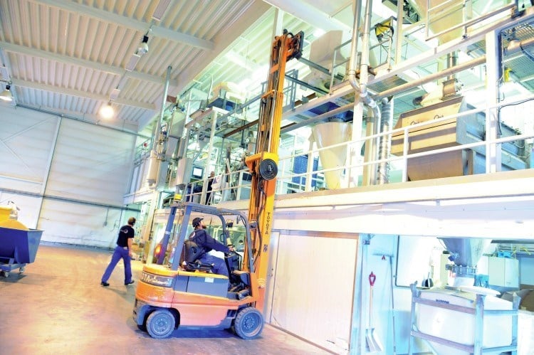 A picture of a forklift in a Skretting factory